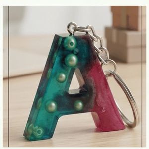 Handcrafted Dual-Tone Resin Alphabet Initial Keychain with Embedded Pearls